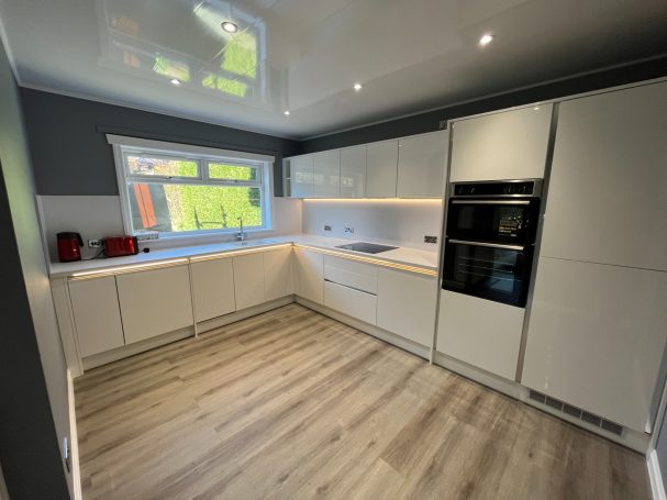 Modern handless kitchen installation Glasgow with LED lighting and LVT flooring